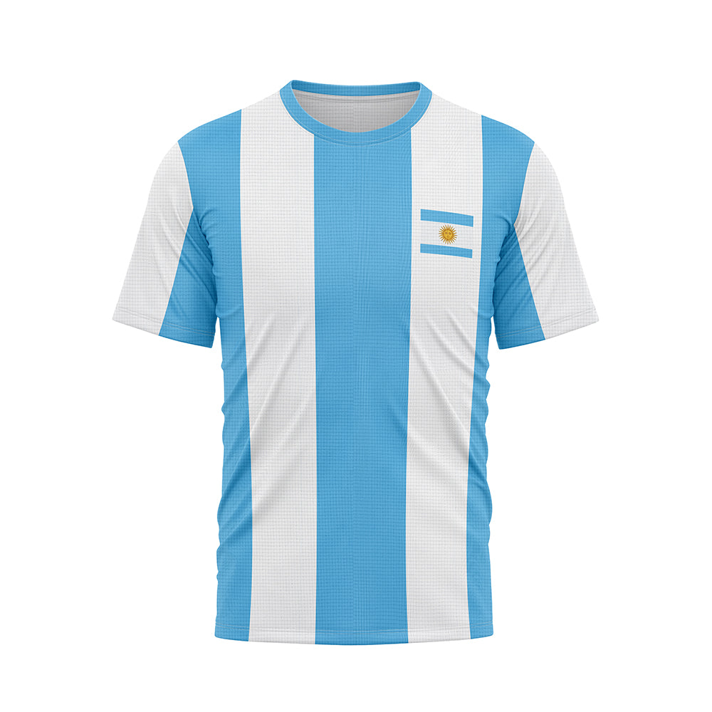 Front view of a T-shirt with vertical light blue and white stripes. A small Argentine flag emblem is on the left chest area. The T-shirt has a white collar