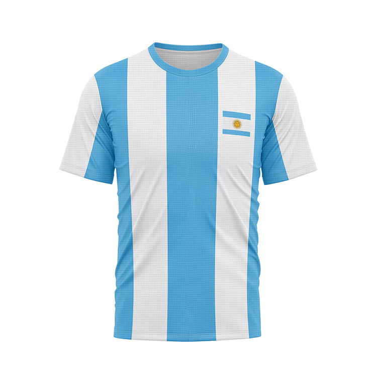 Front view of a T-shirt with vertical light blue and white stripes. A small Argentine flag emblem is on the left chest area. The T-shirt has a white collar
