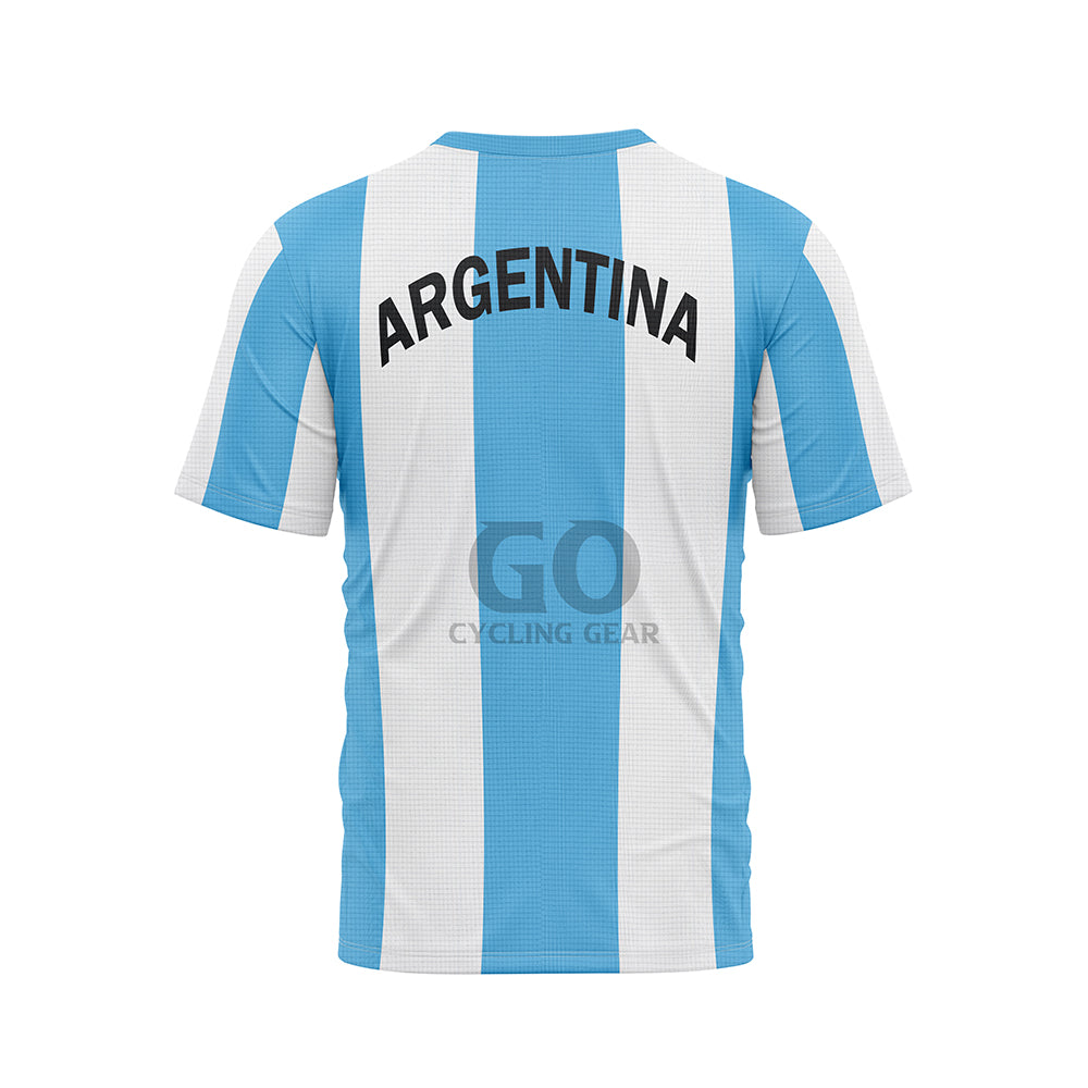 Back view of a T-shirt with vertical light blue and white stripes. 'ARGENTINA' is written in prominent black capital letters across the upper back. The T-shirt has a light blue ribbed collar