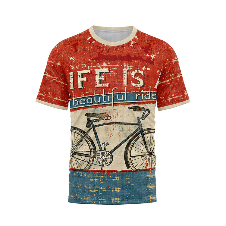 Front view of a vintage-style T-shirt with a distressed red top, a light beige middle section featuring a classic bicycle illustration, and a distressed blue bottom. The text 'LIFE IS a beautiful ride' is prominently displayed in the red and beige sections