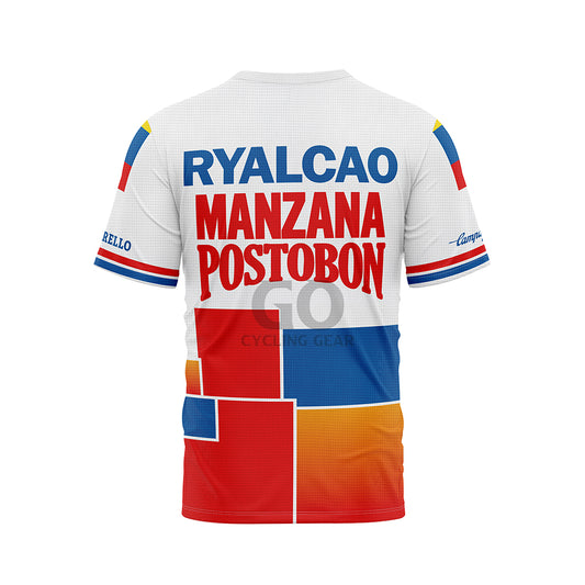 Front view of a white, red, blue, and orange t-shirt with "RYALCAO MANZANA POSTOBON" in blue and red text