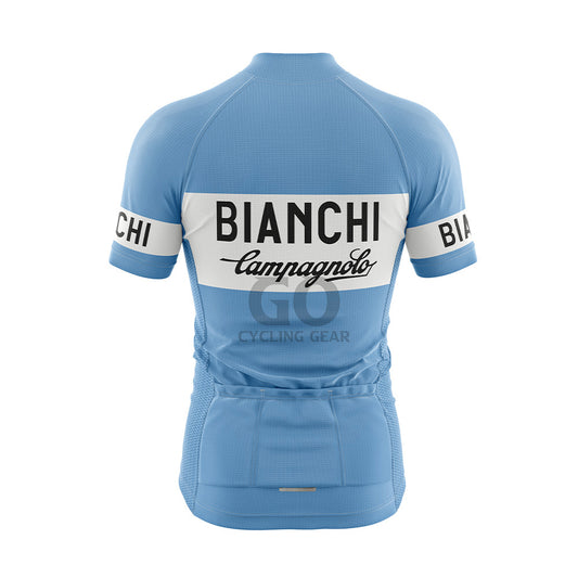 Back view of a light blue short-sleeved cycling jersey. It displays a white band across the upper back with "BIANCHI" in black capitalized letters and "Campagnolo" in black cursive underneath. There are three pockets visible on the lower back, and the sleeves feature white bands with "BIANCHI" in black text.