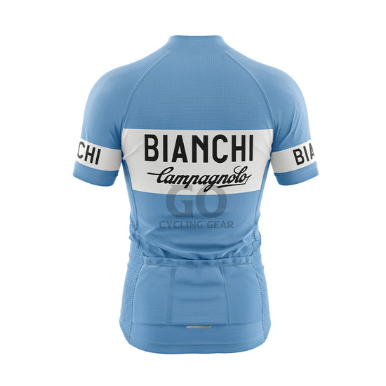 Back view of a light blue short-sleeved cycling jersey. It displays a white band across the upper back with "BIANCHI" in black capitalized letters and "Campagnolo" in black cursive underneath. There are three pockets visible on the lower back, and the sleeves feature white bands with "BIANCHI" in black text.