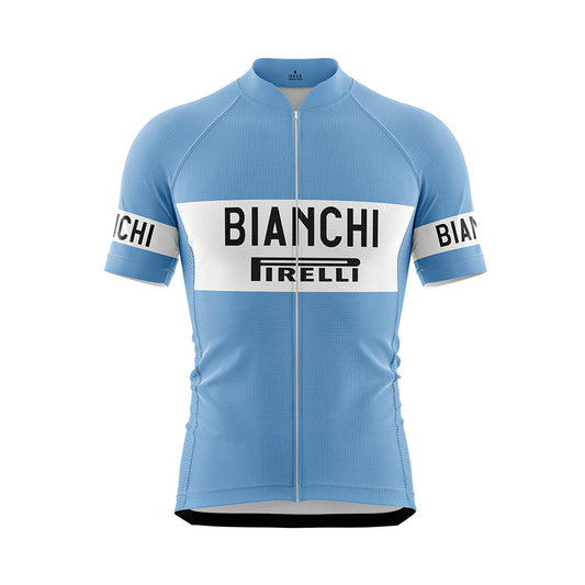 Front view of a light blue short-sleeved cycling jersey with a full-length zipper. A white horizontal band across the chest features "BIANCHI" in large black capitalized letters, with a black "PIRELLI" logo underneath. The sleeves have white bands with "BIANCHI" in black text.